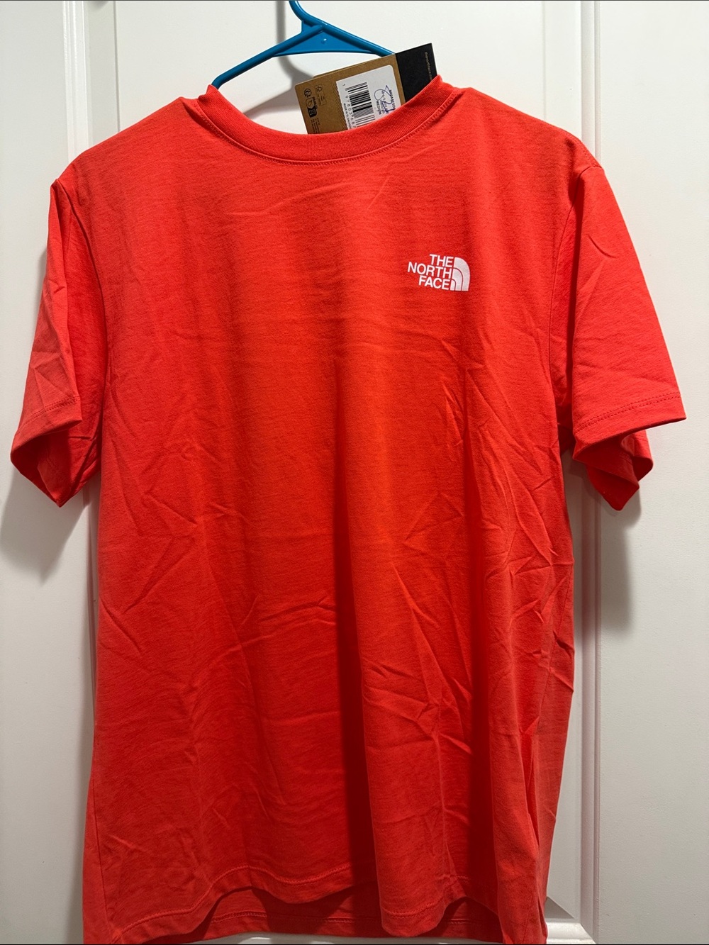 The North Face woman’s  Short Sleeve Tee in Bright Red